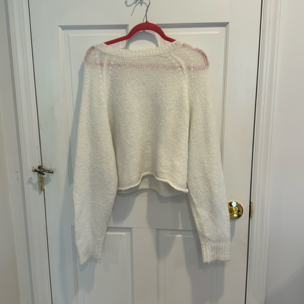 white garage sweater